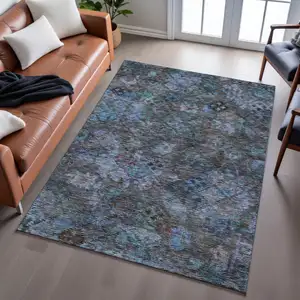 Photo of Teal And Charcoal Abstract Geometric Washable Area Rug With UV Protection