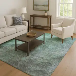 Photo of Teal And Charcoal Abstract Washable Area Rug With UV Protection
