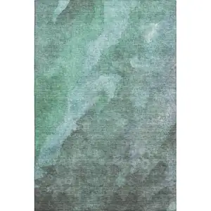 Photo of Teal And Charcoal Abstract Washable Area Rug With UV Protection