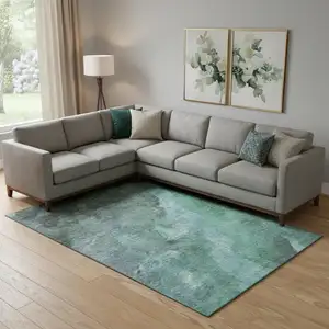 Photo of Teal And Charcoal Abstract Washable Area Rug With UV Protection