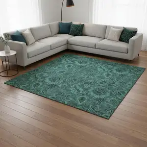 Photo of Teal And Charcoal Floral Washable Area Rug With UV Protection