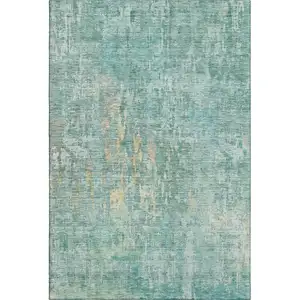 Photo of Teal And Gold Abstract Washable Area Rug With UV Protection