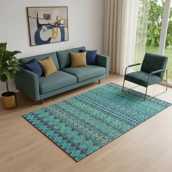Teal And Gold Ikat Washable Area Rug With UV Protection Photo 1