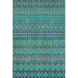 Photo of Teal And Gold Ikat Washable Area Rug With UV Protection