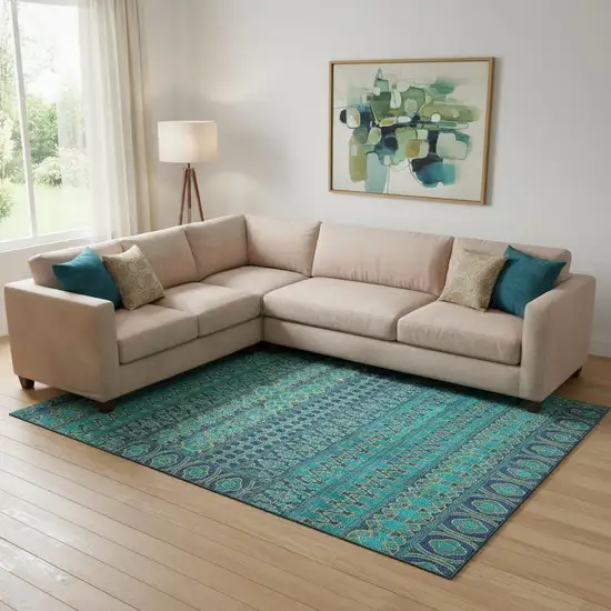 Teal And Gold Ikat Washable Area Rug With UV Protection Photo 1