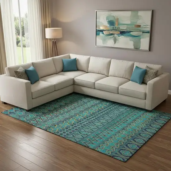 Teal And Gold Ikat Washable Area Rug With UV Protection Photo 1