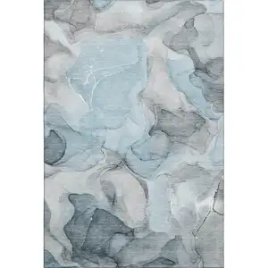 Photo of Teal And Gray Abstract Washable Area Rug With UV Protection
