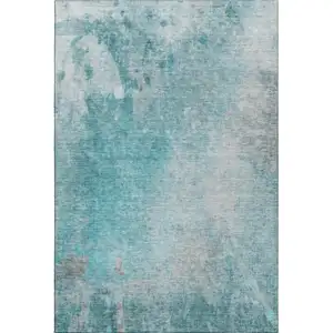 Photo of Teal And Gray Abstract Washable Area Rug With UV Protection