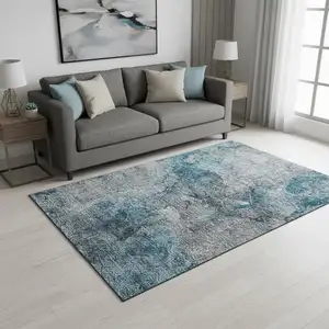 Photo of Teal And Gray Abstract Washable Area Rug With UV Protection