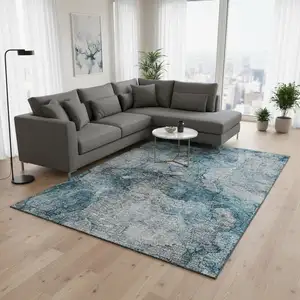 Photo of Teal And Gray Abstract Washable Area Rug With UV Protection