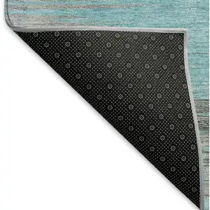 Photo of Teal And Gray Abstract Washable Area Rug With UV Protection