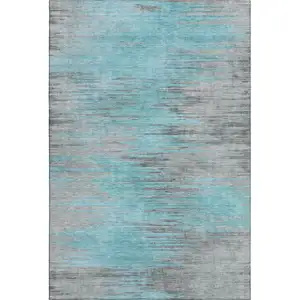 Photo of Teal And Gray Abstract Washable Area Rug With UV Protection