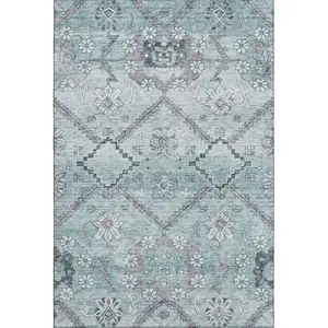 Photo of Teal And Gray Floral Washable Area Rug With UV Protection