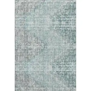 Photo of Teal And Gray Geometric Washable Area Rug With UV Protection