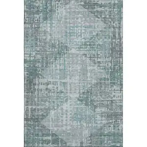Photo of Teal And Gray Geometric Washable Area Rug With UV Protection