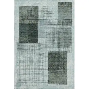Photo of Teal And Gray Geometric Washable Area Rug With UV Protection