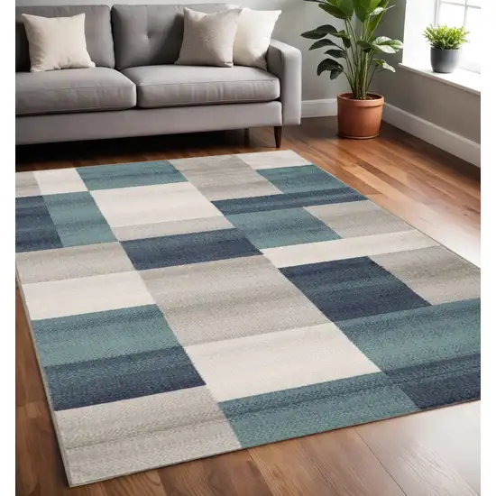 Teal And Ivory Patchwork Area Rug Photo 1