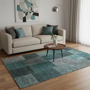 Photo of Teal And Gray Patchwork Washable Area Rug With UV Protection