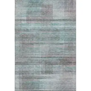 Photo of Teal And Gray Striped Washable Area Rug With UV Protection