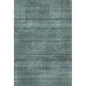Photo of Teal And Gray Striped Washable Area Rug With UV Protection