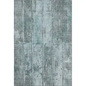 Photo of Teal And Gray Striped Washable Area Rug With UV Protection