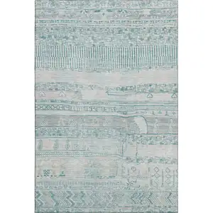 Photo of Teal And Gray Striped Washable Area Rug With UV Protection