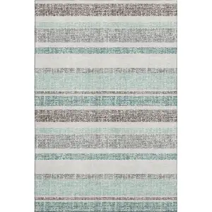 Photo of Teal And Gray Striped Washable Area Rug With UV Protection
