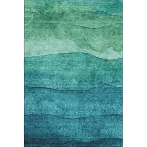 Photo of Teal And Green Striped Washable Area Rug With UV Protection