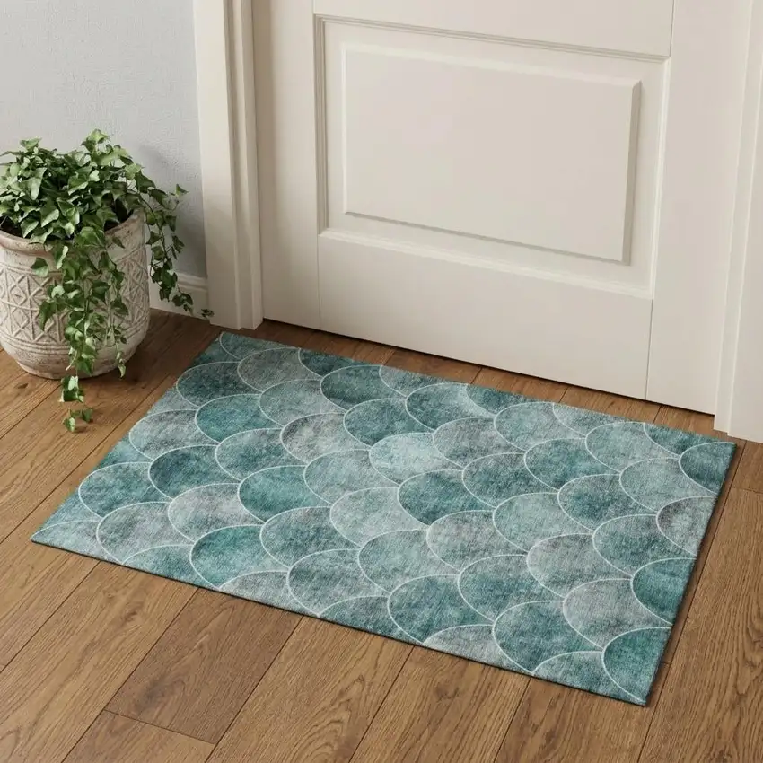 Teal And Ivory Abstract Geometric Washable Area Rug With UV Protection Photo 1
