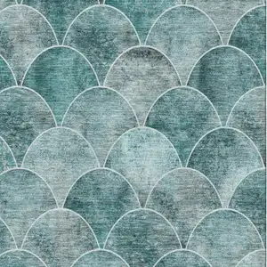 Photo of Teal And Ivory Abstract Geometric Washable Area Rug With UV Protection