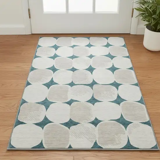 Teal And Ivory Abstract Geometric Washable Area Rug With UV Protection Photo 2