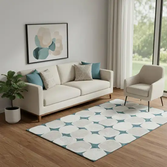 Teal And Ivory Abstract Geometric Washable Area Rug With UV Protection Photo 1