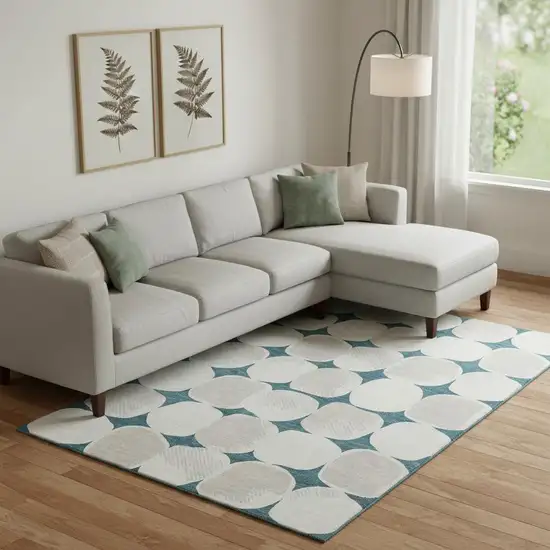 Teal And Ivory Abstract Geometric Washable Area Rug With UV Protection Photo 1