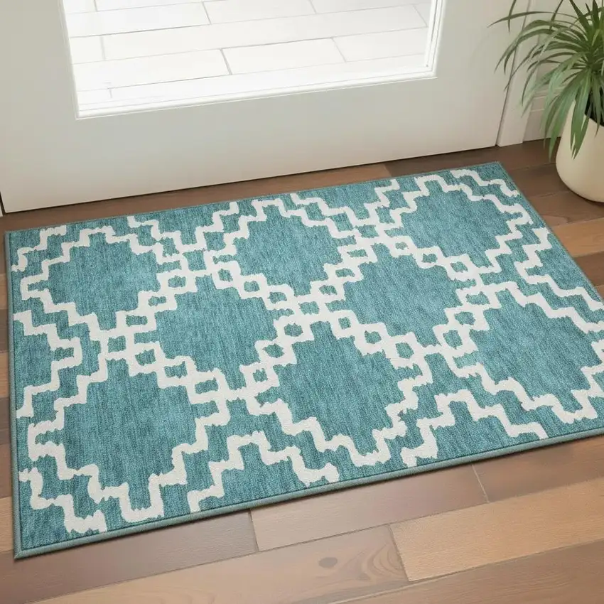 Teal And Ivory Abstract Geometric Washable Area Rug With UV Protection Photo 2