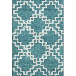 Photo of Teal And Ivory Abstract Geometric Washable Area Rug With UV Protection