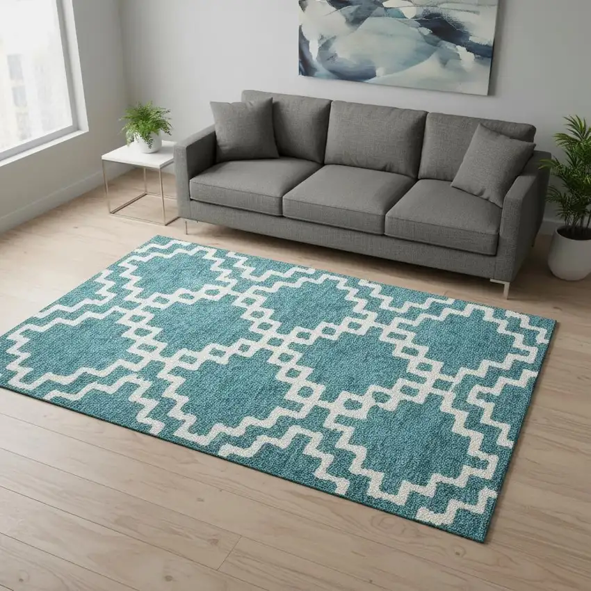 Teal And Ivory Abstract Geometric Washable Area Rug With UV Protection Photo 2