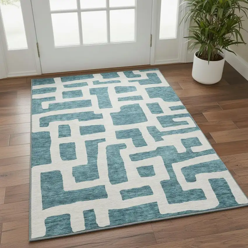 Teal And Ivory Abstract Geometric Washable Area Rug With UV Protection Photo 2