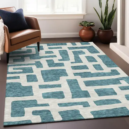 Teal And Ivory Abstract Geometric Washable Area Rug With UV Protection Photo 4