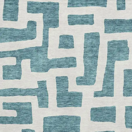 Teal And Ivory Abstract Geometric Washable Area Rug With UV Protection Photo 3
