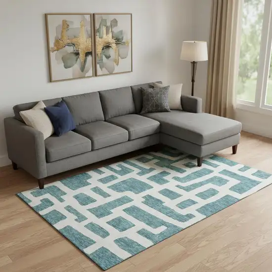 Teal And Ivory Abstract Geometric Washable Area Rug With UV Protection Photo 1