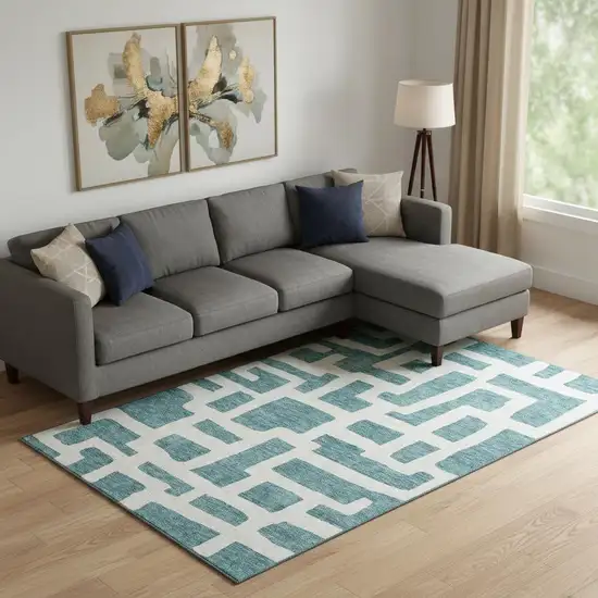 Teal And Ivory Abstract Geometric Washable Area Rug With UV Protection Photo 1