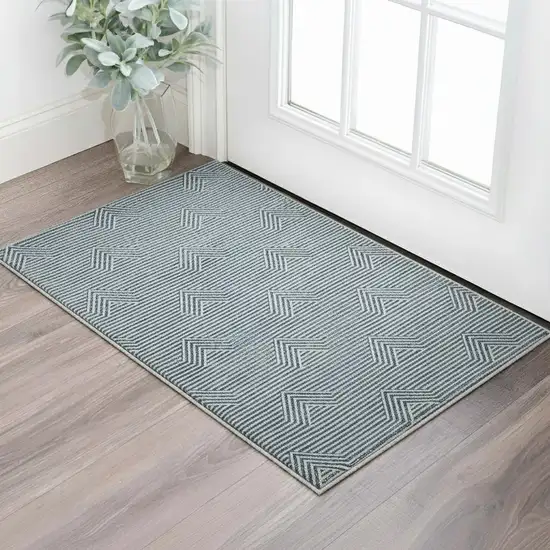 Teal And Ivory Abstract Geometric Washable Area Rug With UV Protection Photo 2