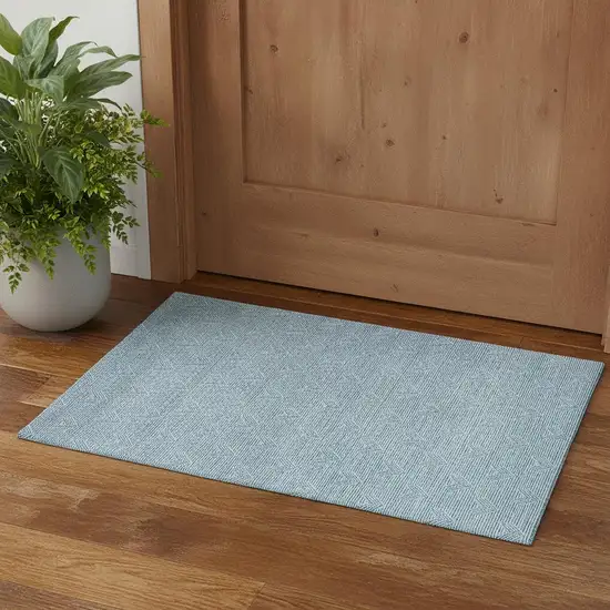 Teal And Ivory Abstract Geometric Washable Area Rug With UV Protection Photo 1