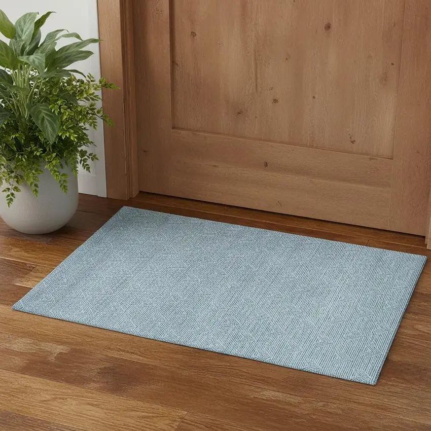 Teal And Ivory Abstract Geometric Washable Area Rug With UV Protection Photo 1