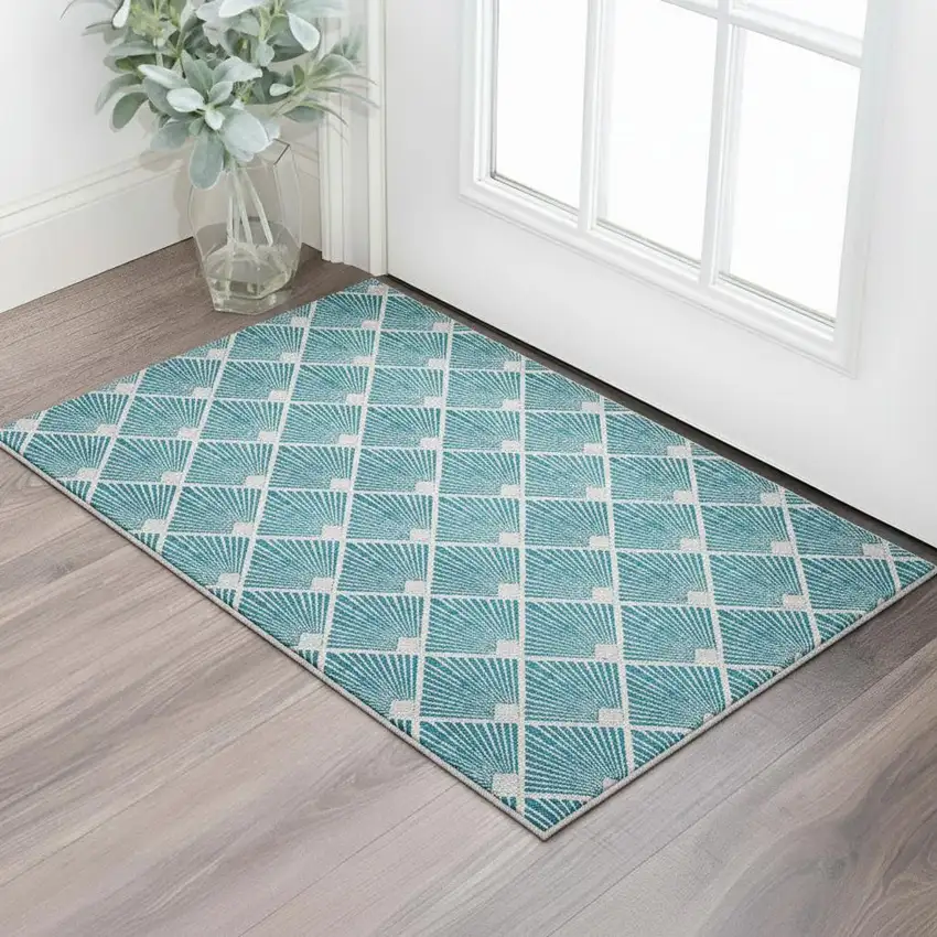 Teal And Ivory Abstract Geometric Washable Area Rug With UV Protection Photo 2