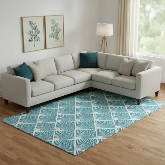 Teal And Ivory Abstract Geometric Washable Area Rug With UV Protection Photo 1