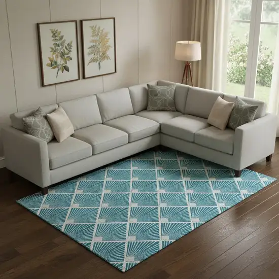Teal And Ivory Abstract Geometric Washable Area Rug With UV Protection Photo 1