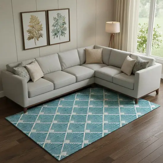 Teal And Ivory Abstract Geometric Washable Area Rug With UV Protection Photo 1