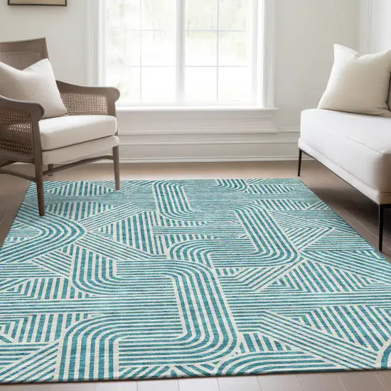 Teal And Ivory Abstract Geometric Washable Area Rug With UV Protection Photo 4