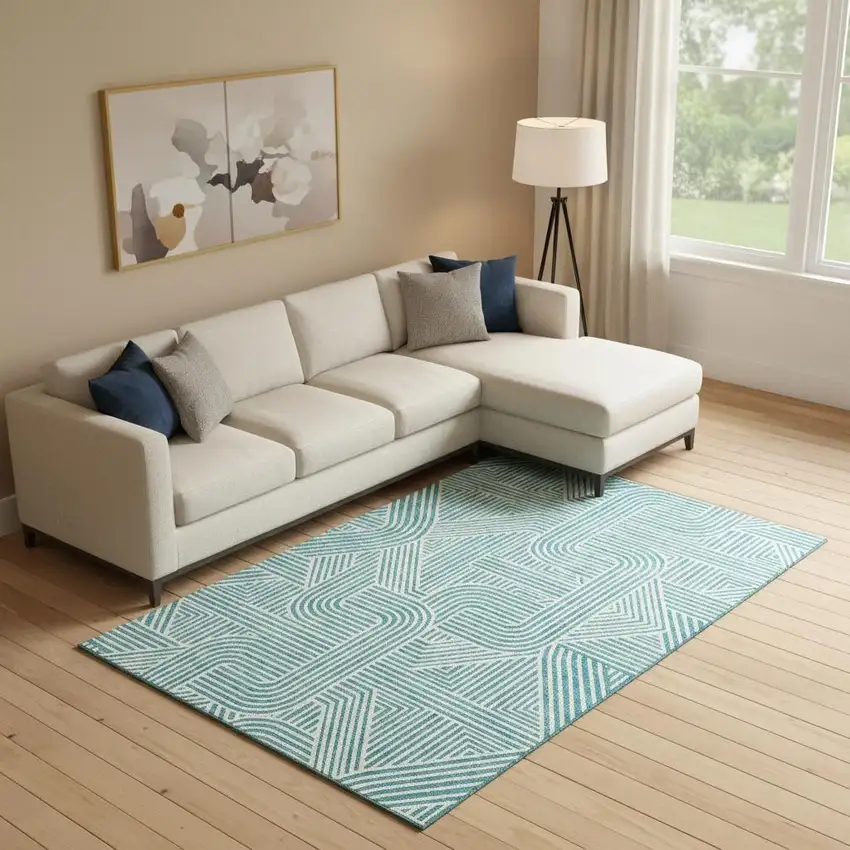 Teal And Ivory Abstract Geometric Washable Area Rug With UV Protection Photo 1